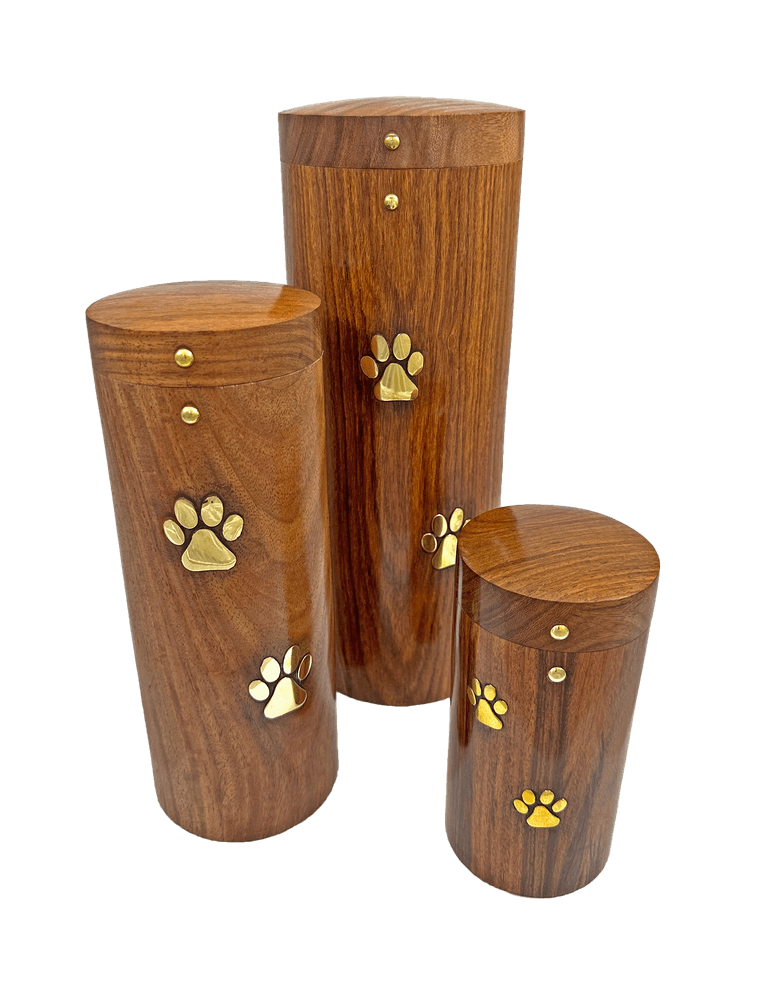 three turned sheesham scatter tubes of different heights, each inlaid with brass paw prints